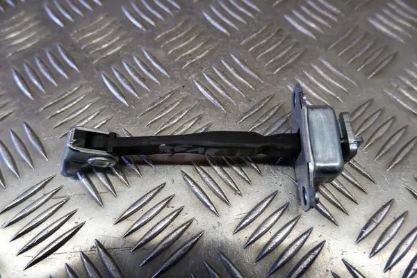 Tope puerta trasera izquierda Toyota Yaris P21 OEM 68630K0010 image 3
