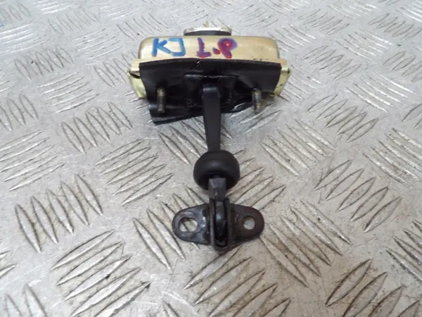 Jeep Cherokee KJ vasen etuoven rajoitin OEM image 3