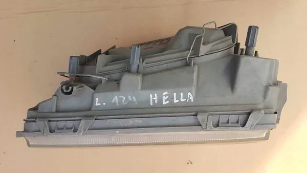 Linker Scheinwerfer Hella Mercedes W124 1248200161 image 3