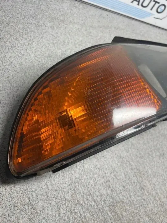 Cobertura farol dianteiro esquerdo OEM 15214000 BMW 5 E39 image 6