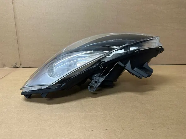 Farol Frontal Esquerdo RENAULT CLIO III OEM 7701072012 image 3