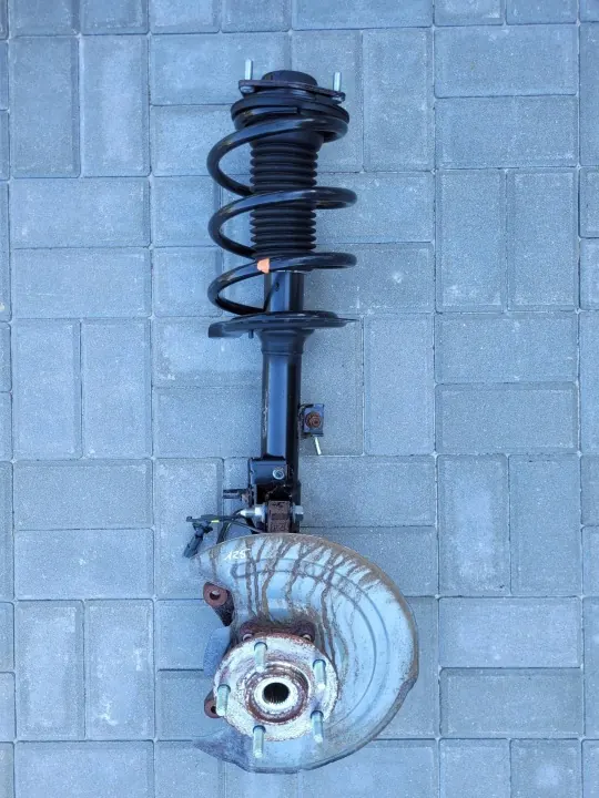 Amortecedor esquerdo Mitsubishi OE LUOA1856943 - Usado image 3