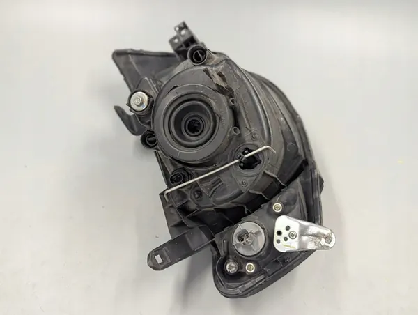 Faros izquierdo Mitsubishi L200 05-10 H4 OEM image 3