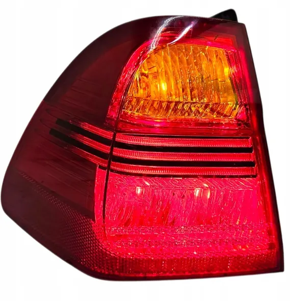 BMW E91 Faro Trasero Izquierdo OEM 7160061 image 10