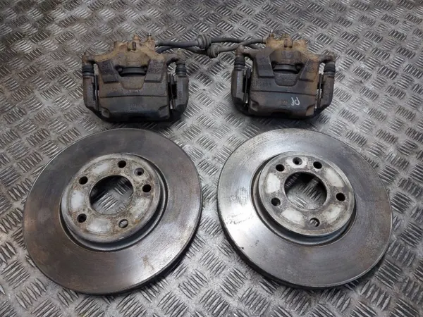 Bromsskivor + Belägg + Bromsok Fram Opel Astra J OEM image 2