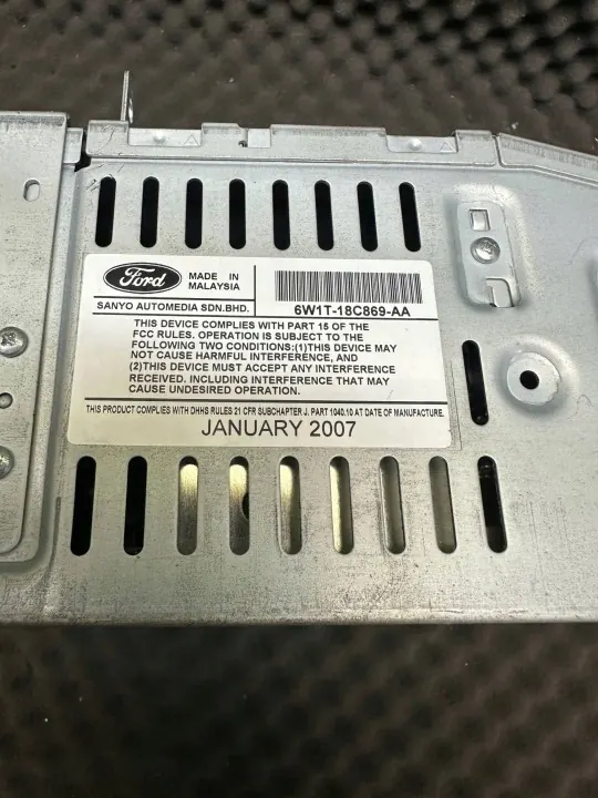 Radio OEM 6W1T18C869AA para Lincoln Town Car image 7