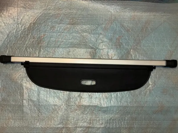 KIA EV6 bagageutrymmesrullgardin OEM 85940-CV000 image 2