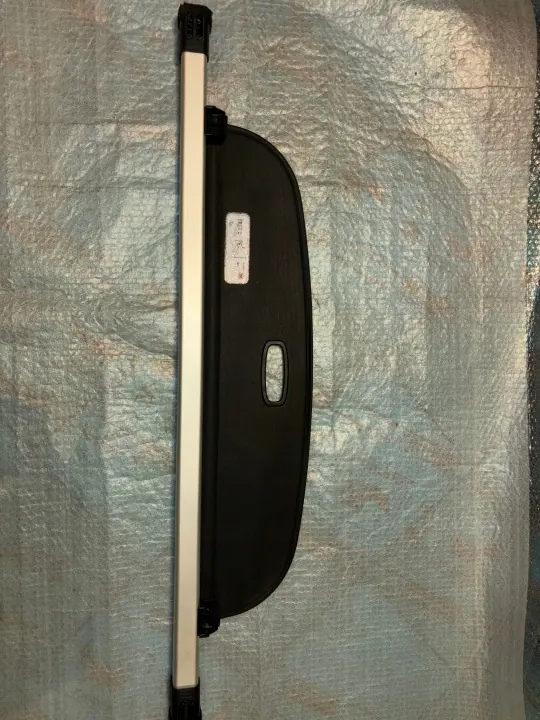 KIA EV6 bagageutrymmesrullgardin OEM 85940-CV000 image 3