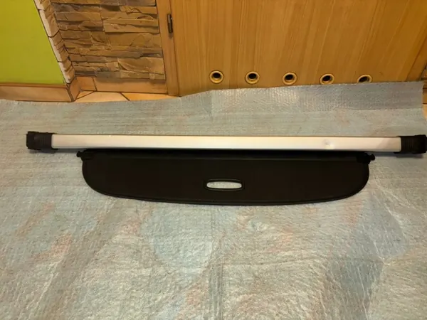 KIA EV6 bagageutrymmesrullgardin OEM 85940-CV000 image 7