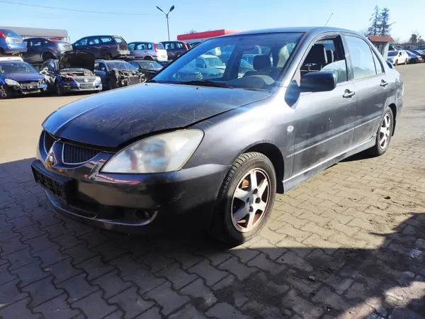 Höger framlykta Mitsubishi Lancer VII OEM MN161674 image 5
