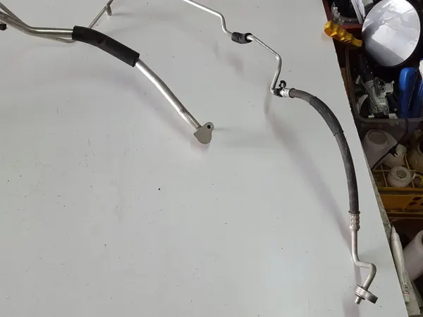 Opel OE 13312825 Ilmastointijohdin image 2