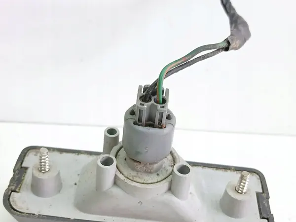 Luz de matrícula Mitsubishi Colt 1991 OEM 1141253 image 3