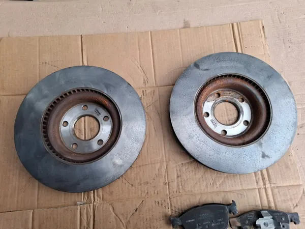 Discos de freno delanteros Ford OEM JX61-1125-BEB (Usados) image 7