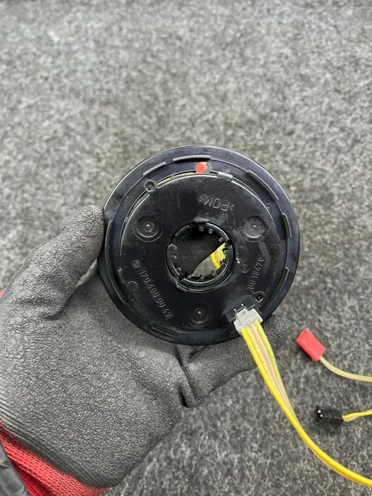 Cinta enrolladora Mercedes W210 OEM 1704600049 Usada image 3