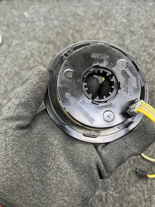 Cinta enrolladora Mercedes W210 OEM 1704600049 Usada image 4