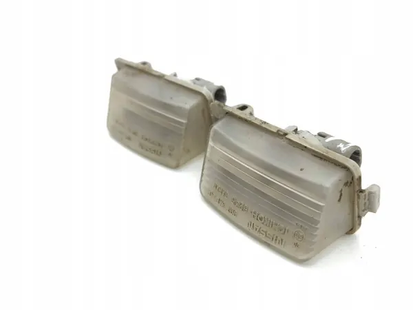 Registreringsskyltsljus Nissan 350Z 2004 OEM AMD191195 image 8