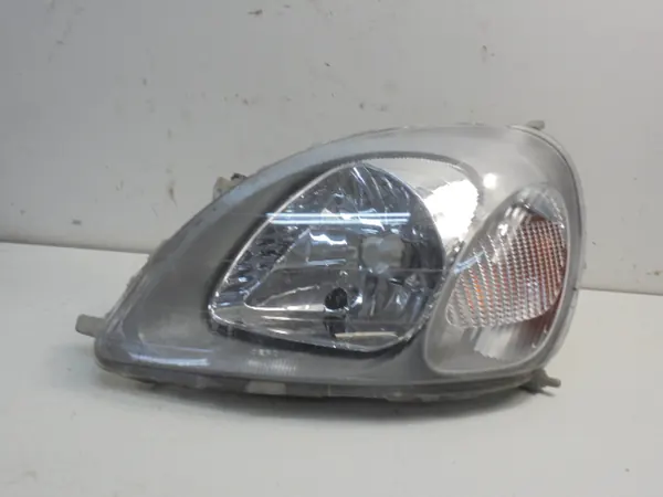 Refletor de farol esquerdo TOYOTA YARIS I P1 OEM 212-11A2L image 1