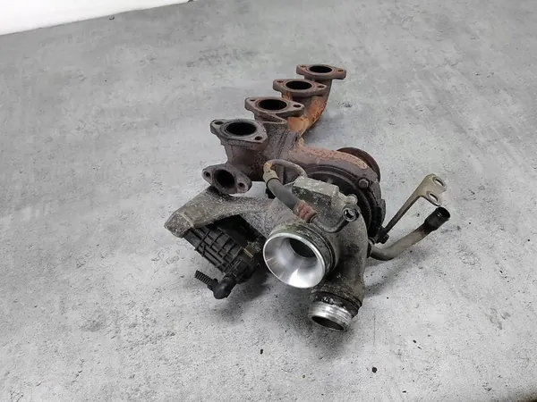 Turbo con Colector BMW E91 2.0 D 318d OEM 781018902 image 2
