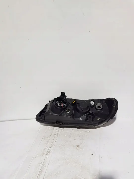 Nissan Almera N16 2004 Oikea ajovalaisin image 2