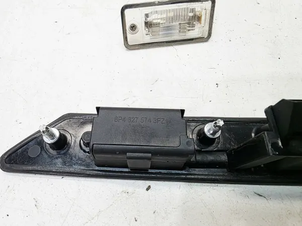 OEM 8P4827574 3/26 Kennzeichenleuchtenblende Audi image 8