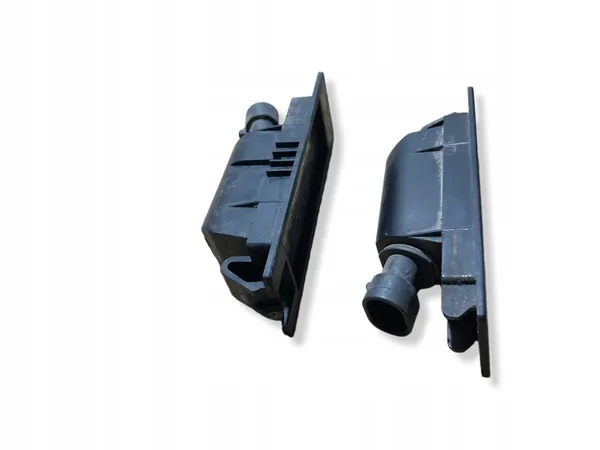 Opel Astra Kennzeichenbeleuchtung OE 13139990 image 2