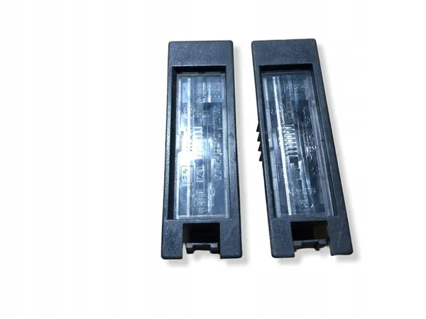 Opel Astra Kennzeichenbeleuchtung OE 13139990 image 3