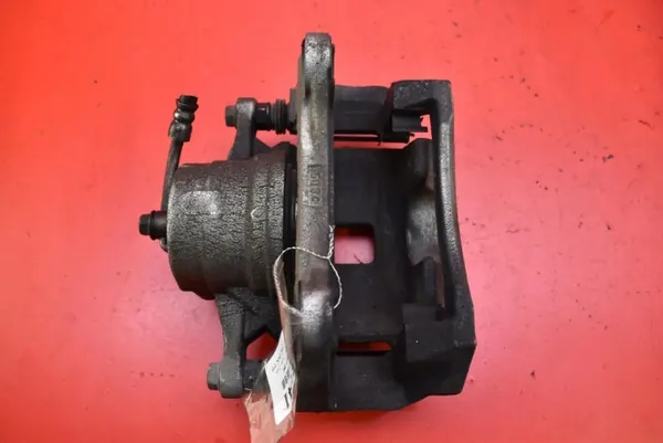 Bromsokla fram höger OEM 58130R2100 - Begagnad image 6