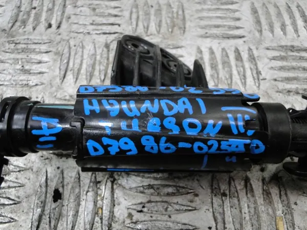 Ajovalopesuri vasen etu OEM D7986-02590 Hyundai Tucsonille image 5