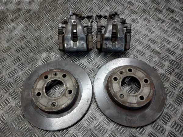 OEM TARCZE HAMULCOWE TYŁ + KLOCKI + ZACISKI OPEL ASTRA H image 2