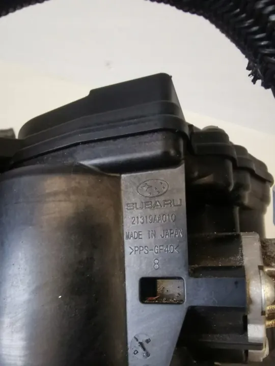 Carcaça termóstato Subaru OEM 21319AA010 Usado image 5