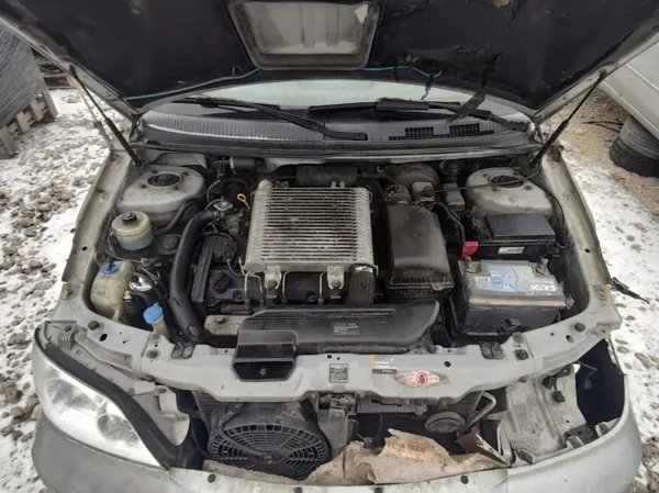 Colector de escape OEM 2080198 Kia Carnival 2004 image 6