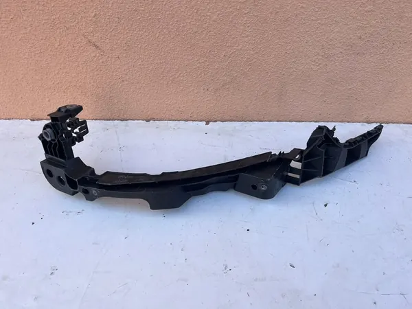 VW GOLF VI Support de Phare Gauche 1K9807571D image 1