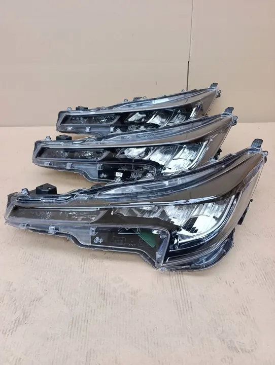 Farol esquerdo Toyota Corolla E21 2019-2025 HB,Kombi OEM image 1