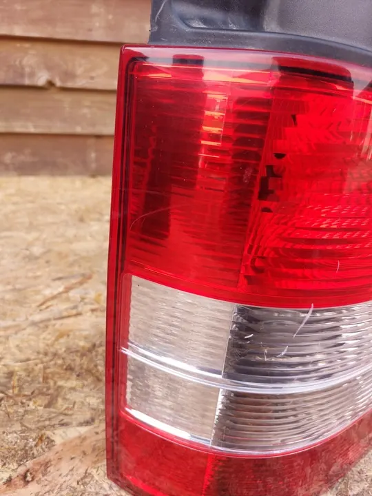 Soporte de lámpara trasera izquierda Volkswagen T5 2004-2015 OEM 7H5945257A image 3