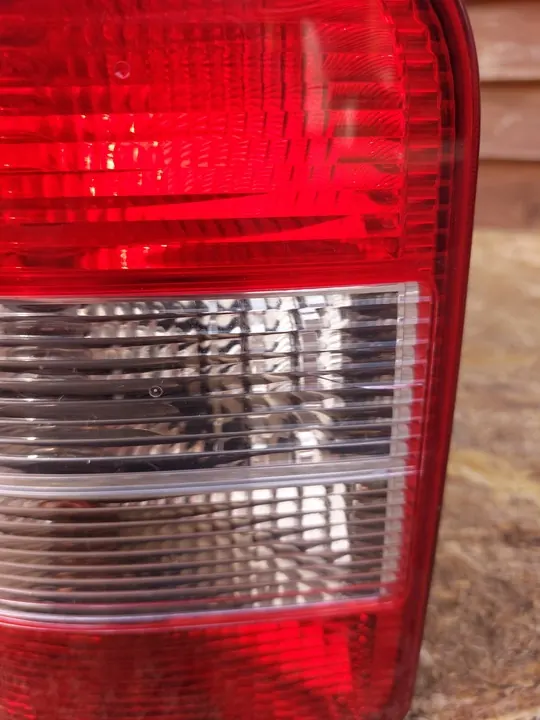 Soporte de lámpara trasera izquierda Volkswagen T5 2004-2015 OEM 7H5945257A image 5