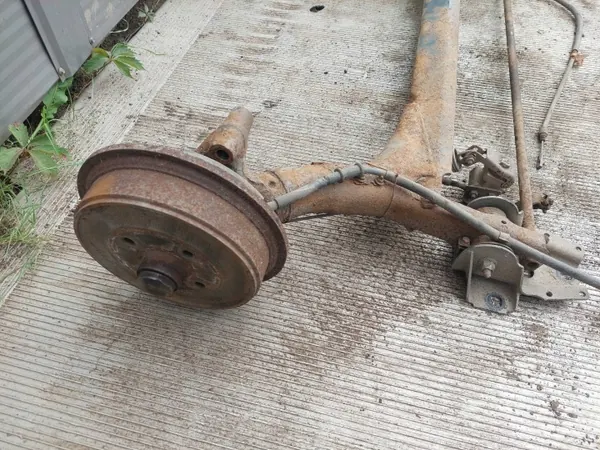 Viga do eixo traseiro OEM BELKA OŚ ZAWIESZENIA TYŁ BĘBNY BEZ ABS image 3