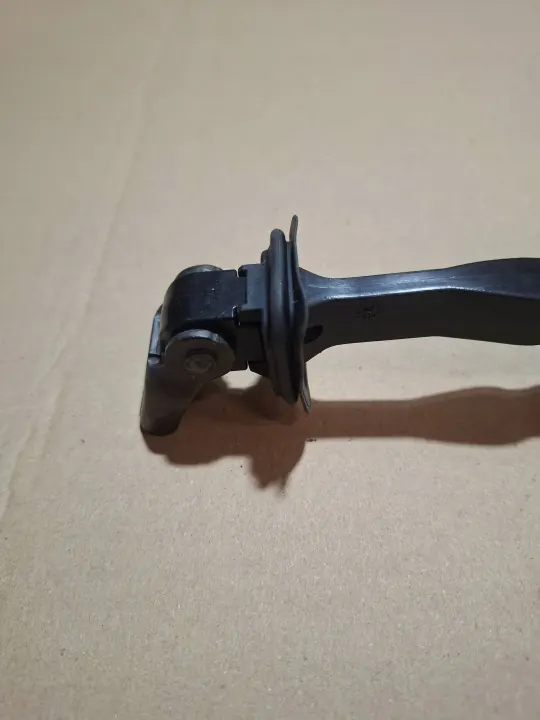 OEM 7C0837249A framdörrsöppningsbegränsare - Begagnad image 4
