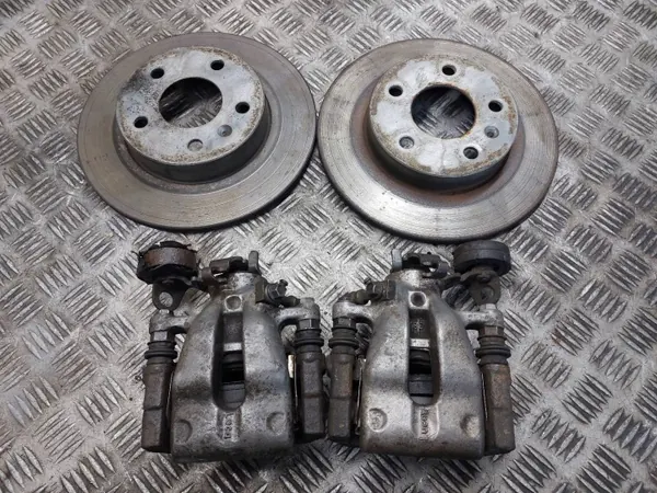Bromsskivor + Belägg + Bromsok Bak Opel Zafira A OEM image 2