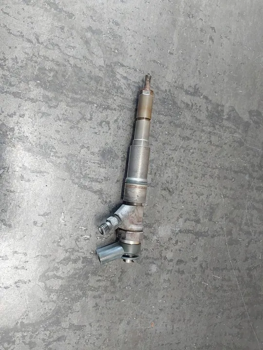 Inyector BMW OE 7788609 image 2