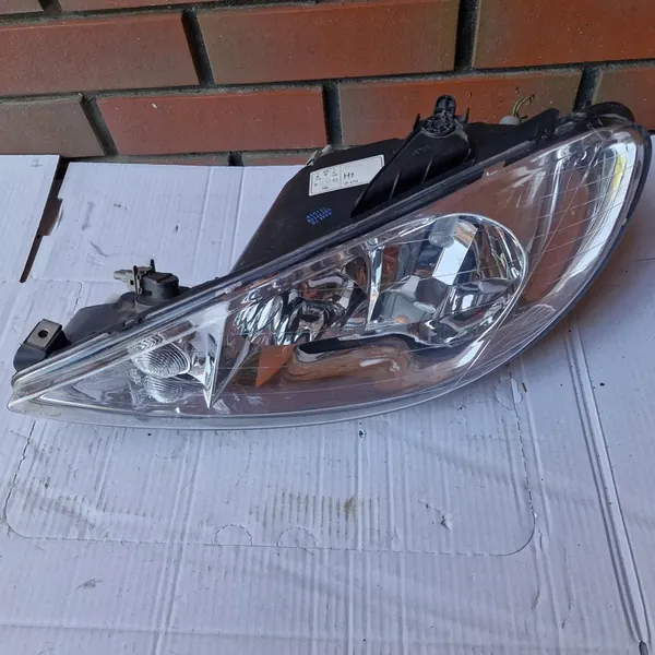 Farol esquerdo para Peugeot 206 TYC image 5