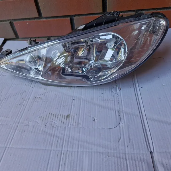 Farol esquerdo para Peugeot 206 TYC image 7