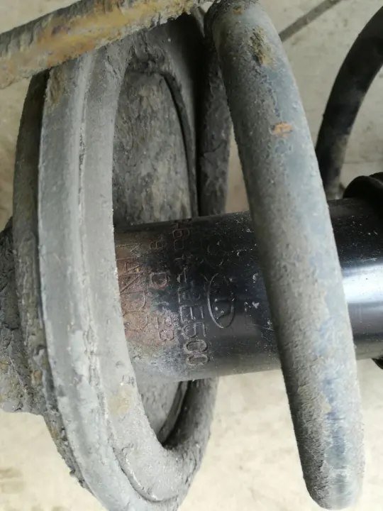 OEM TUCSON I AMORTYZATOR SPRĘŻYNA LEWY PRZÓD image 5