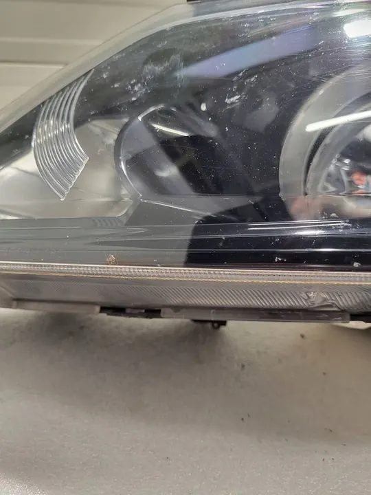 KIA Sportage III Lente del faro izquierdo 92101-3U210 image 2