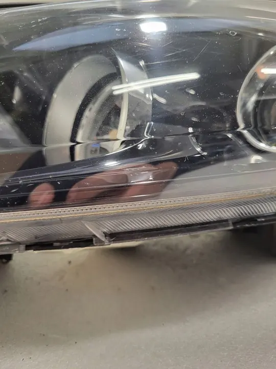 KIA Sportage III Lente del faro izquierdo 92101-3U210 image 3