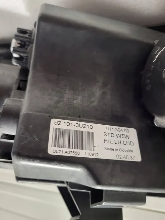 KIA Sportage III Lente del faro izquierdo 92101-3U210 image 8