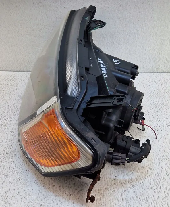 Faros delanteros izquierdo H4 para Mitsubishi L200 IV 06-10 MN146195 image 2