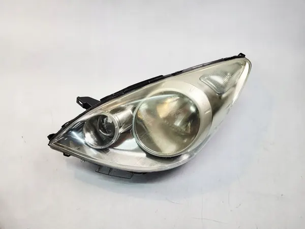 Vasen ajovalaisin Nissan Note 1 E11 Lift 09-14 OEM 26060BH10B image 2