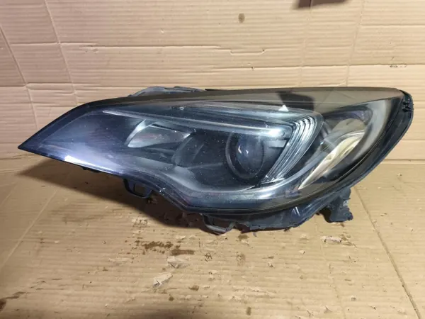 Faro delantero izquierdo Opel Astra V OEM 39077802 image 2