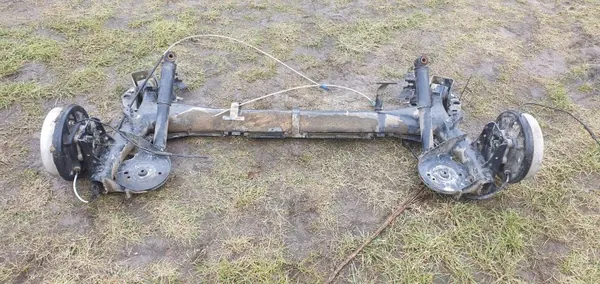 Bakaxel OEM OŚ BELKA ZAWIESZENIE TYŁ TYLNE BĘBNY image 3
