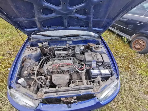 Alternador Mitsubishi Colt 1996 1.3L md325696 image 8